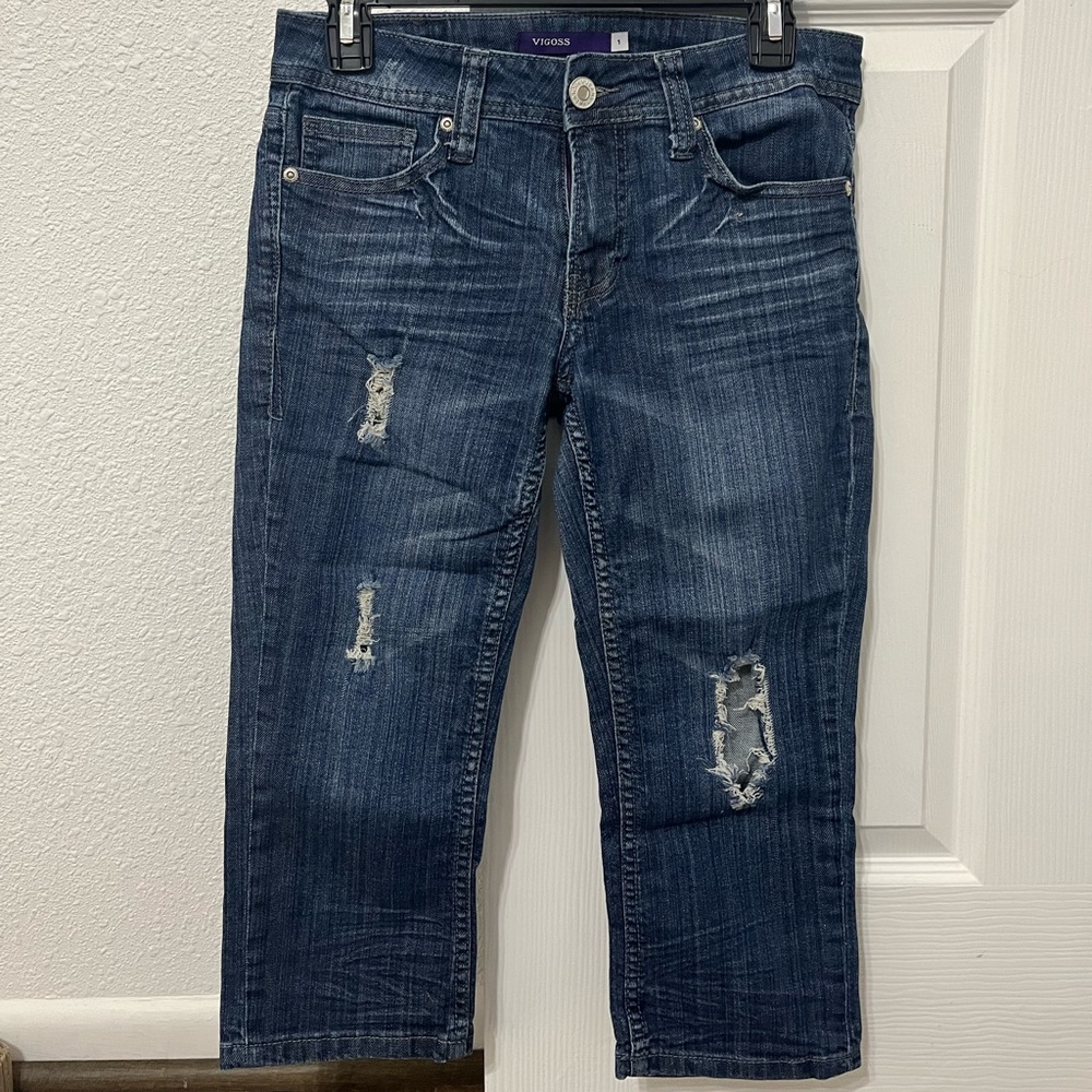 Vigoss capri pants, size 1. Dark wash with distressed holes on the front.